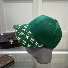 SHOP MORE LUXURY PRODUCTS HERE Description Louis Vuitton Match Cap Green LV Cap Luxurious textures and iconic House emblems characterize this LV Match cap. This sporty piece is finished with a Monogram Jacquard visor, an embroidered composition of a tennis ball with the LV Circle at the side and a strap at the back. The style is part of a new collection inspired by the world’s four historic tennis tournaments. GreenJacquard weaveMonogram patternTennis ball with LV Circle embroidery Include Designer Snapback Baseball Cap With Embroidered Logo, Designer Baseball Cap With Embroidered Logo, Designer Embroidered Logo Baseball Cap, Luxury Visor Baseball Cap For Streetwear, Luxury Streetwear Baseball Cap, Luxury Baseball Cap For Streetwear With Visor, Designer Curved Brim Baseball Cap For Streetwear, Designer Streetwear Cap, Designer Baseball Cap With Curved Brim For Streetwear