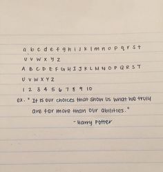 a piece of lined paper with writing on it and some type of font in the middle