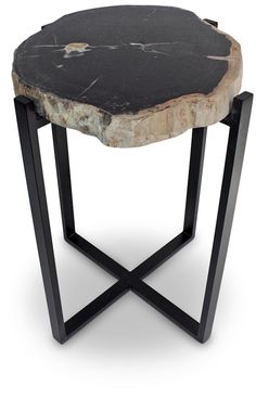 a black and white marble table with metal legs