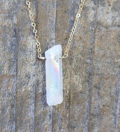 This product is made of metal alloy (silver and copper and other metal alloy) with high quality plating (It will last for a long time without tarnish). Handmade with love in Sausalito, California | A Blonde and Her Bag. Single Raw Rainbow Quartz Crystal Pendant Necklace in Silver. A single raw rainbow quartz crystal pendant sits on a classic silver chain. Size: 16" Necklace with 1" Long Stone. Hypoallergenic | 1-800-Flowers Birthday Delivery Single Rainbow Qtz Crystal Pendant Necklace In Gold Sausalito California, 16 Necklace, Quartz Crystal Pendant, Rainbow Quartz, Crystal Pendant Necklace, Crystal Necklace Pendant, Classic Gold, Personalized Birthday Gifts, Personalized Birthday