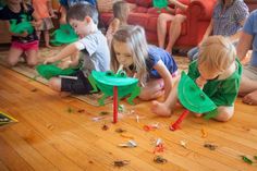 several children playing with toys on the floor