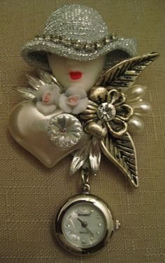 BONETTO Watch Brooch Rivoli Rhinestone Faux Pearl Heart Silver Gold Tone Metal Girl Woman Face Brooch Watch Dangle MOP Watch In Original Box Womans Face, Face Rhinestones, Handwritten Gifts, Rhinestone Watches, Silver Flower Earrings, Beaded Evening Bags, Pearl Heart, Porcelain Roses