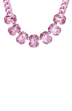 Show off sparkling color in this pretty pink curb-chain frontal necklace showcasing glamorous pink crystals. 18" length; 2" extender Lobster clasp closure Pink plate/glass Imported Pink Crystal Rhinestone Necklace In Glamorous Style, Pink Rhinestone Jeweled Necklace For Parties, Pink Crystal Rhinestone Necklace, Pink Chain Jewelry For Formal Occasions, Formal Pink Jewelry With Chain Detail, Formal Pink Jewelry With Chain, Formal Pink Chain Jewelry, Pink Crystal Glamorous Necklace, Glamorous Pink Rhinestone Necklace