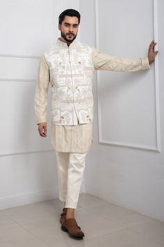 Ivory Nehru jacket embroidered with shimmer thread and beads in floral and bird motif. Paired with thread, beads embroidered kurta and coordinating pant. - Aza Fashions Cream Nehru Jacket With Chikankari Embroidery For Reception, White Nehru Jacket With Cutdana For Reception, Off White Nehru Jacket With Resham Embroidery For Reception, Designer White Nehru Jacket With Naqshi, Off White Long Sleeve Nehru Jacket With Naqshi, Festive White Outerwear With Chikankari Embroidery, Cream Nehru Jacket With Naqshi For Reception, White Chikankari Embroidery Outerwear For Eid, Fitted White Outerwear With Zari Work