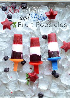 red, white and blue fruit popsicles on ice