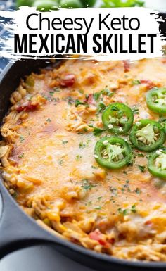 a skillet filled with cheesey keto mexican skillet and topped with jalapenos