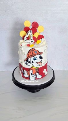 a birthday cake with a dog on it