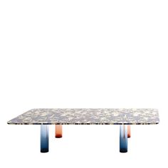 a marble table with two blue legs and an orange light on the top, against a white background