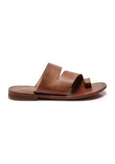 Fashioned in luxe leather, these sandals from Free People will last you for years to come. | Free People Abilene Toe Loop Sandals, 7M US / 38 EU Classic Round Toe Sandals For Summer, Classic Summer Sandals With Round Toe, Classic Brown T-strap Sandals For Summer, Classic Open Toe Sandals For Summer, Classic Open Toe Summer Sandals, Classic Sandals With Leather Footbed For Spring, Leather Toe Loop Slides For Spring, Classic Single Toe Strap Sandals For Spring, Classic Sandals With Single Toe Strap For Spring