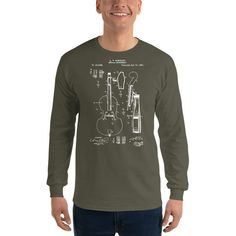 Cello Patent Long Sleeve Shirt that will certainly make a perfect gift for your friend or loved one. Awesome design for passionate people. Quality shirts and fast processing of all orders 24/7, I answer all question quickly and my main focus is on customer satisfaction.If there's anything you want to ask go ahead and send me a message.  If you need any other type of shirt (ladies, v neck, polo, long sleeve or hoodie) just write to me and I'll make it for you, no problemo. If you need a shirt qui Pre-shrunk Long Sleeve Band Merch Shirt, Long Sleeve Screen Print T-shirt Gift, Long Sleeve Screen Print T-shirt As Gift, Graphic Print Long Sleeve Shirt As Gift, Long Sleeve Cotton Shirt For Concert, Long Sleeve Cotton Shirt As Gift, Music-themed Long Sleeve Cotton Top, Music-themed Cotton Long Sleeve Top, Cello Player