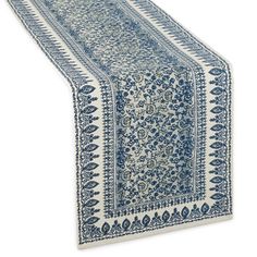 a table runner with blue and white designs