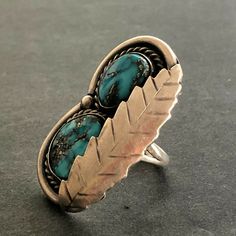 "VINTAGE NAVAJO RING DESCRIPTION: Two breathtaking specimens of high blue Morenci turquoise, this ring will be a treasured addition to your collection of fine vintage Native American jewelry. MEASUREMENTS: Ring face measures 1 5/8\" x 1\" RING SIZE: 7 1/4 WEIGHT: 14.9 grams SIGNED: no STERLING: unmarked, verified sterling silver" Heirloom Turquoise Ring For Collectors, Southwestern Turquoise Rings With Patina, Artisan Rings With Patina For Collectors, Vintage Sterling Silver Turquoise Ring With Inlay, Antique Handmade Blue Turquoise Ring, Antique Handmade Turquoise Blue Ring, Vintage Turquoise Oval Ring, Handmade Antique Blue Turquoise Ring, Vintage Blue Turquoise Ring Stamped 925