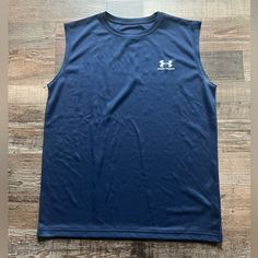 Under Armour Performance Jersey - Sleeveless. Dark Blue Color. New Without Tags. Sizes Youth M And L. Used To Own A Store And Now We Are Liquidating The Left Over Inventory. Original Price $24.00. Please Look At All Pictures For Details And Send Me A Message If U Have Any Questions Prior To Purchasing. Great Deal! I Can Also Bundle For Better Deals And Save On Shipping. Left Over, Dark Blue Color, Under Armour Shirts, Kids Shirts, And Now, Under Armour, Shirts Tops, Dark Blue, Great Deals