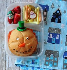 a plastic container filled with food on top of a table