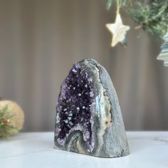 This is a unique Amethyst with unusual druzy cave formations on one side. The stone you will receive is the exact one as in the picture. ✧ MEASURES: Width: 4.5 in x Height: 4.5 in. Weight 1.7 lb (784 gr) Unique Amethyst Geodes As Gift, Unique Purple Geodes For Gifts, Unique Purple Geodes For Gift, Healing Amethyst Geodes, Amethyst Geodes Gemstone Gift, Amethyst Geodes Raw Stone As Gift, Amethyst Raw Stone Geodes As Gifts, Amethyst Geode Raw Stone Gift, Purple Large Stone Geode As Gift