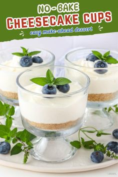 no - bake cheesecake cups with fresh blueberries and mint on the side