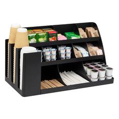 an organized coffee cup holder holds several cups and other items, including paper towels, napkins, and tea bags