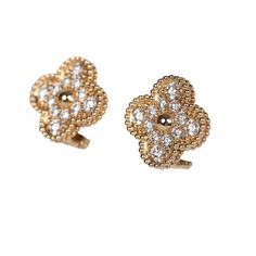 These Van Cleef & Arpels Vintage Alhambra earrings have 24 round cut diamonds set in 18K yellow gold with a clip back closure and detachable stems.Origin: FranceCondition: New and never wornAccompanied by: VCA gift box, VCA green jewelry box, authenticity card, carebookMeasurements: .5" x .5" Motifs Luxury Flower Shaped Cluster Earrings For Formal Occasions, Luxury Flower Shaped Cluster Earrings For Formal Events, Luxury Flower-shaped Cluster Earrings For Formal Occasions, Classic Yellow Gold Flower-shaped Cluster Earrings, Formal Yellow Gold Cluster Earrings In Flower Shape, Luxury Brilliant Cut Flower-shaped Earrings, Luxury 14k Gold Flower-shaped Earrings, Luxury 14k Gold Flower Shaped Earrings, Luxury Yellow Gold Cluster Earrings With Brilliant Cut