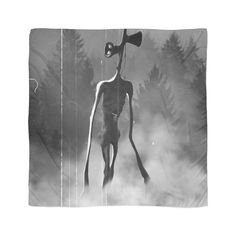 a black and white photo of an alien hanging from a pole in the air with trees behind it