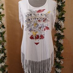 Flattering Fit With Fringe Detail Hd Tunic T-Shirt. Unique Graphics With Crystal Bead Embellished Letters. The Fringe Moves When You Walk & Ride. This One Will Get You Noticed With Compliments. Retired Style. Nwot. New Condition, Never Worn Size Large Red Fringe Tops For Summer, Fitted White Tops With Fringe, White Fitted Fringe Tops, Bohemian Embellished Short Sleeve Tops, Embellished Letters, Unique Graphics, Tunics, Crystal Beads, Harley Davidson