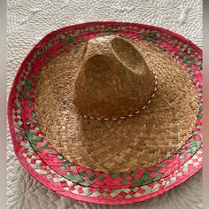 Non Gender Specific, Brand New Traditional Style Wide Brimmed Mexican Hat (Sombrero) . Features Colorful Trim On Edges, Traditional Indentations On The Large Crown Top, A Beautifully Colored Rope Tie To Keep In Place, And It Has Never Been Worn. 20” Wide/8” Tall/22” Circumference. Perfect For Cinco De Mayo! Multicolor Brimmed Panama Hat In Toquilla Straw, Multicolor Woven Brimmed Panama Hat, Western Multicolor Brimmed Straw Hat, Multicolor One-size Fedora Straw Hat, Green Wide-brim Toquilla Straw Hat, Colorful Trim, Mexican Sombrero, Large Crown, Non Gender