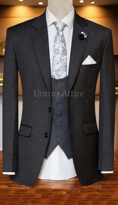 This charcoal grey wedding suit, crafted from premium Italian fabric, is the epitome of timeless elegance.  The slim-fit design flatters your figure, while the notch lapels, double vents, and single-breasted vest exude sophistication. ‍♂️

#weddingday #groomstyle #charcoalgreysuit #italiansuit #menswedding #weddingattire #groomtobe #weddingfashion #groomsgift #justmarried #mensfashion #dapper #weddingphotography #weddinginspiration #luxuryweddings Fitted Gray Suit For Wedding, Gray Tuxedo With Suit Collar For Wedding, Gray Collared Tuxedo For Wedding, Gray Groom's Suit, Fitted Gray Tuxedo For Groom, Gray Tuxedo For Wedding, Gray Notch Lapel Blazer For Wedding, Classic Gray Suits For Wedding, Gray Fitted Blazer For Wedding