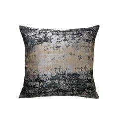 a black and gold pillow on a white background