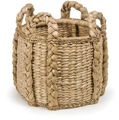 a large woven basket with handles and braiding on the sides, isolated against a white background