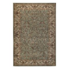 a blue rug with brown and beige accents