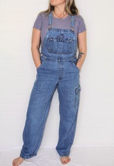 Vintage 1990s 'B.U.M Equipment' medium wash long denim overalls.  In excellent vintage condition.  Fabric: Cotton Size: 8-10 Australian   Measurements  Length: 147cm (adjustable) Waist: 82cm Hips: 98cm Rise: 28cm Follow us on Instagram @cultofvtg 90s Style Denim Jumpsuit With Pockets, Vintage Light Wash Denim Overalls, Vintage Light Wash Overalls With Pockets, Retro Straight Leg Overalls With Pockets, Vintage Denim Blue Jumpsuit With Pockets, Vintage Denim Blue Overalls With Pockets, 90s Style Medium Wash Denim Jumpsuit, 90s Style Denim Overalls With Pockets, 90s Denim Overalls With Pockets