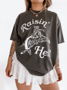 Raisin' Hell Cowgirl Western Tee | Bohemian Retro Vintage Tee Shirt Country Graphic Tees, Vintage Tee Shirt, Western Tee, Western Graphic Tees, Vintage Tee Shirts, Retro Graphic Tees, Photo Edits, Cute Shirt Designs, Cowgirl Western