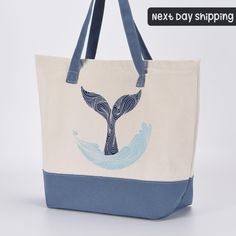 Whale Tail Tote Bag, Ocean Design Tote Bag, Marine Life Beach Bag,  Sea Lover Gift, Blue Whale Tote Canvas Bag, Sea Life Tote Bag How to Place an Order? 1)Pick Color of the Tote Bag 2)Pick Printing option (Non Print is plain bag - no design on it) 2 Color bags comes with Zipper Only. Plain Colors are without zipper. ------------- We'll ship your custom-designed tote bag within 1 to 3 days of receiving your order, straight from our shop in Houston.  Processing is 1-3 days. After we make your orde Blue Canvas Tote Beach Bag, Blue Canvas Beach Bag For Shopping, Blue Canvas Beach Tote Bag, Blue Canvas Bag With Large Capacity And Double Handle, Blue Canvas Bag With Removable Pouch, Blue Large Capacity Pouch Bag, Large Capacity Blue Canvas Travel Bag, Large Capacity Blue Canvas Bag For Travel, Large Capacity Blue Pouch Bag