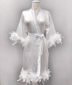 Bride Robe With Feathered Bride Kimono Satin Robe With Skirt | Etsy Elegant Satin Robe With Feathers, Feathered Robe For Wedding Night, Elegant Robe With Feather Trim For Wedding Night, Wedding Satin Robe With Feathers, Elegant Wedding Robe With Feathers, White Satin Party Robe, Fitted Satin Sleepwear For Wedding, Satin Wedding Dress With Feather Trim, Wedding Satin Dress With Feather Trim