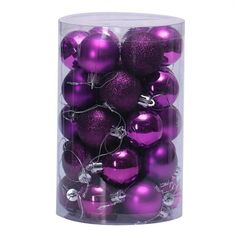 purple christmas ornaments in a clear container