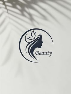 a woman's face with long hair and the word beauty on it is shown