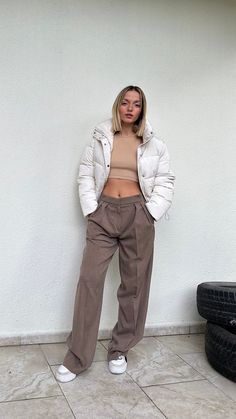 Trendy Beige Winter Pants, Chic Relaxed Fit Winter Pants, Relaxed Fit High-waisted Pants For Winter, Winter High-waisted Beige Pants, Relaxed Fit High-waisted Winter Pants, Relaxed Fit Ankle-length Winter Bottoms, Fitted Neutral Bottoms For Winter, Beige Bottoms For Winter Workwear, Beige Straight Leg Parachute Pants For Workwear