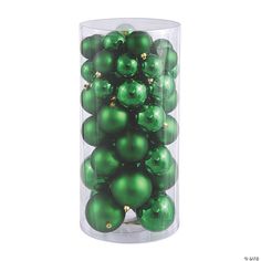 green christmas ornaments in a clear container