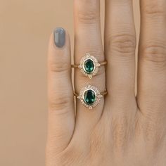 Valley – Olive Avenue Jewelry Heirloom Emerald Ring With Halo Design, Heirloom Style Emerald Ring With Halo, Heirloom Emerald Ring With Halo, Classic Emerald Ring With Halo, Timeless Oval Emerald Ring With Bezel Setting, Classic Round Emerald Ring With Halo, Oval Halo Emerald Ring For May Birthstone, Oval Halo Ring With May Birthstone, Heirloom Green Oval Halo Ring