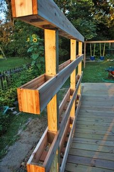 a wooden fence with some wood planks attached to the top and bottom bars on each side