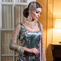 Bring out the royalty in you with our Mahra look! The look includes necklace, a pair of earrings and a jhoomar. This necklace and chaand-bali earrings set is beautifully handcrafted with gutka kundan and accentuated with pearl moti. Polish off your look with a vintage-inspired jhoomar featuring decorative motifs in thappa kundan. Approximate earrings length is 3.5". Gold-plated on high-quality brass as base metal. Made by order. Kindly allow 4-6 weeks for the delivery of this item. For custom or Bali Earrings, Faux Stone, Base Metal, Earrings Set, Earring Set, Bali, Vintage Inspired, Royalty, Gold Plate