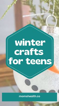 a snowman ornament hanging from a tree with the words winter crafts for teens