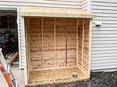 the inside of a storage shed being built