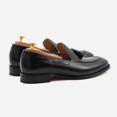 Dress up your casual look. Several decades ago an innovative shoemaker transformed the traditional Oxford into what we know today as the tassel loafer. The upper was formed from a wholecut piece of leather, with a distinct apron toe. The lace stay disappeared, and leather laces weaved through the topside. The entire construction was literally pulled together by the iconic tassels at the front. This sophisticated slip-on took the world by storm, and hasn’t let go since. Whether you’re taking it e Brogue Boots, Fantastic Shoes, Mens Shoes Black, Tassel Loafers, Suede Material, Wedding Men, Shoes Black, Leather And Lace, New Shoes