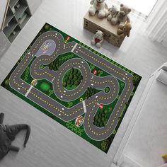 a child's play area with a toy car track and teddy bears on the floor