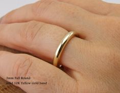 Attractive 10K Solid Yellow Gold ,Dainty Circular Band Ring Any of these ring has high polished , also matt finish available These Ring is SOLID 10 K GOLD, not plated nor filled, each af item has includes 41.7% Pure gold mean 10K These Unique Handmade items are produced with our old aged local process, so any rings are definitely unique. GUARANTEED 100% AUTHENTIC SOLID GOLD We reduce the gold with high quality Europen Alloy catching naturel color of 10K. The Width is 3mm. rounded style The other Round Wedding Band, Thick Ring, Yellow Wedding, Unique Ring, Small Jewelry, Oct 31, Pure Gold, Solid Yellow, Gold Style