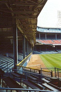 an empty baseball stadium filled with lots of seats