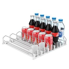 a rack with six soda bottles and two glasses on top of each other, in front of a white background