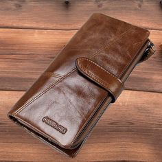 Product information: Product Name：Wallet Material: genuine leather Lining texture: polyester Opening method: zipper buckle Small bag internal structure: concealed compartment, large bill holder, photo position, zipper compartment, ID position, card position Style: casual Color: brown, brown, long black, long brown, long brown Size: 19X9X3CM(L*W*H) Weight: 190g Packing list: Wallet x1 Brown Rectangular Wallet With Zipper Closure, Classic Brown Wallet With Zipper Pocket, Brown Bifold Wallet With Zipper Pocket, Brown Travel Wallet With Zipper Closure, Bill Holder, Men Wallet, Men's Wallet, European Women, Brown Brown