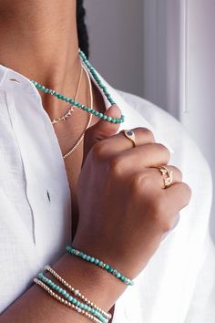 "This 14K Gold Turquoise Necklace is segmented to perfection with seven 14k golden beads and textured turquoise stones. Prized since the dawn of time, turquoise is one of the oldest known gem materials and is the dazzler of December birthstones. With its calming, centering energy, it'll make you feel balanced and chill when life has you overwhelmed and is great for use in meditation.   Made in L.A.  Size of Turquoise Bead: Approx. 4mm Length: 16\"-18\" adjustable 14k yellow gold clasp and chain extension Total Weight: Approx. 7.2g Ships in 3-6 business days All personalized items are Final Sale Comes gift ready in a custom Zoe Lev jewelry box." Turquoise Malachite Beaded Necklace For Gift, Turquoise Polished Beads Jewelry For Healing, Turquoise Beaded Rondelle Jewelry, Turquoise Malachite Beaded Jewelry, Turquoise Polished Chrysocolla Beads Jewelry, Turquoise Chrysocolla Jewelry With Polished Beads, Turquoise Amazonite Single Strand Jewelry, Turquoise Chrysocolla Polished Beads Jewelry, Gold Malachite Jewelry Hand-strung