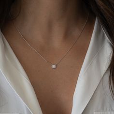 A beautiful and delicate necklace featuring pavé stones shaped as a square makes this a super versatile piece. It layers beautifully and also looks great on its own! Made of 925 Sterling Silver THICK plating of 14k Gold or Rhodium 16" + 3" Extension Chain Nickel-free & Hypoallergenic 5x5mm Pendant We use the highest grade cubic zirconia for an authentic diamond look! Square Necklace, Square Pendant, Delicate Necklace, Necklace Sizes, Precious Metals, Silver Gold, Cubic Zirconia, Gold Necklace, Plating